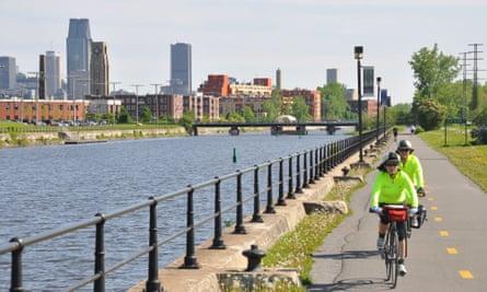Cyclists on a bike path by the Lachine Canal.