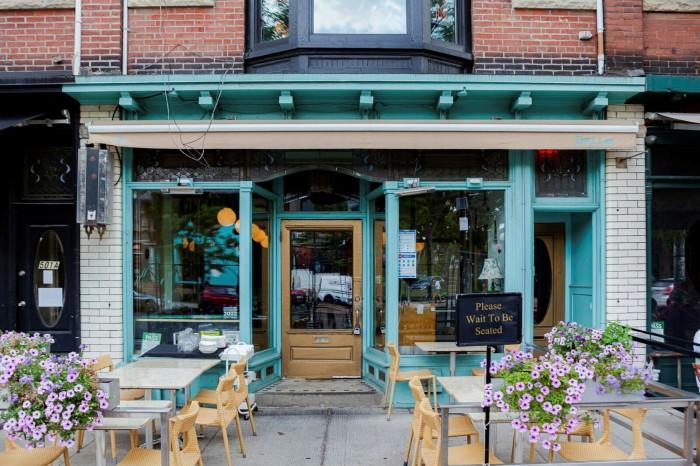 The façade of DaiLo restaurant and outside tables 