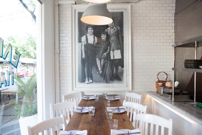 Part of Mamakas Taverna restaurant’s dining area, beside the fr